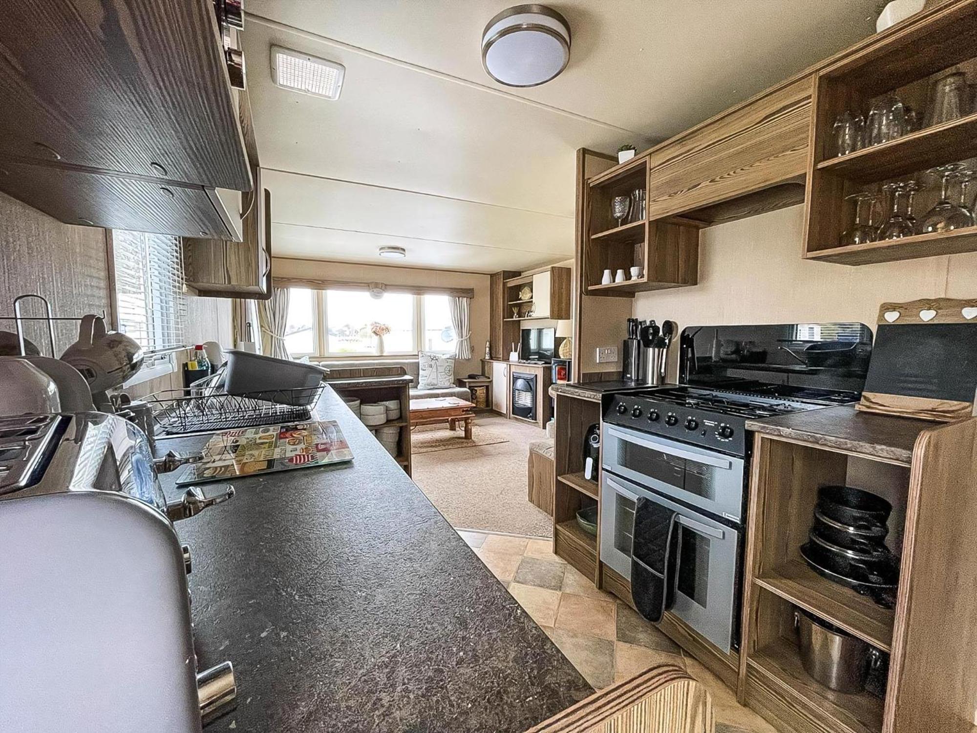 Lovely Caravan With Decking And Free Wifi In Ref 12106b Campsite